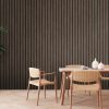 Dining room wall mock up with Areca palm, rattan dining set, woo