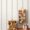 vintage interior in the children's room, wooden toys on the table, children's play table